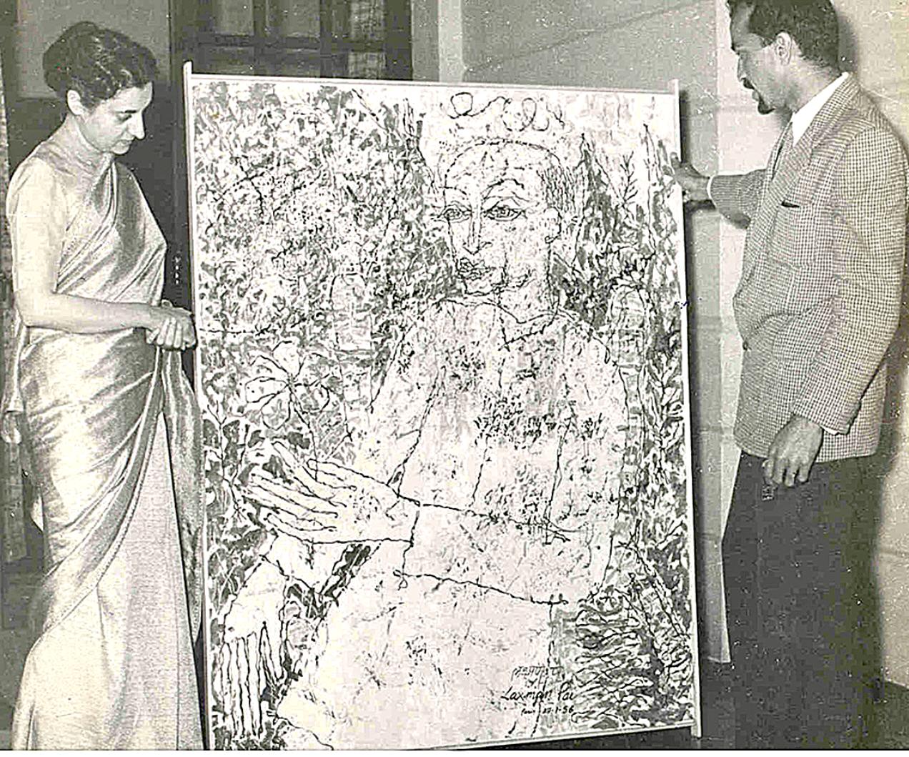 Laxman Pai presents a painting to Prime Minister Indira Gandhi